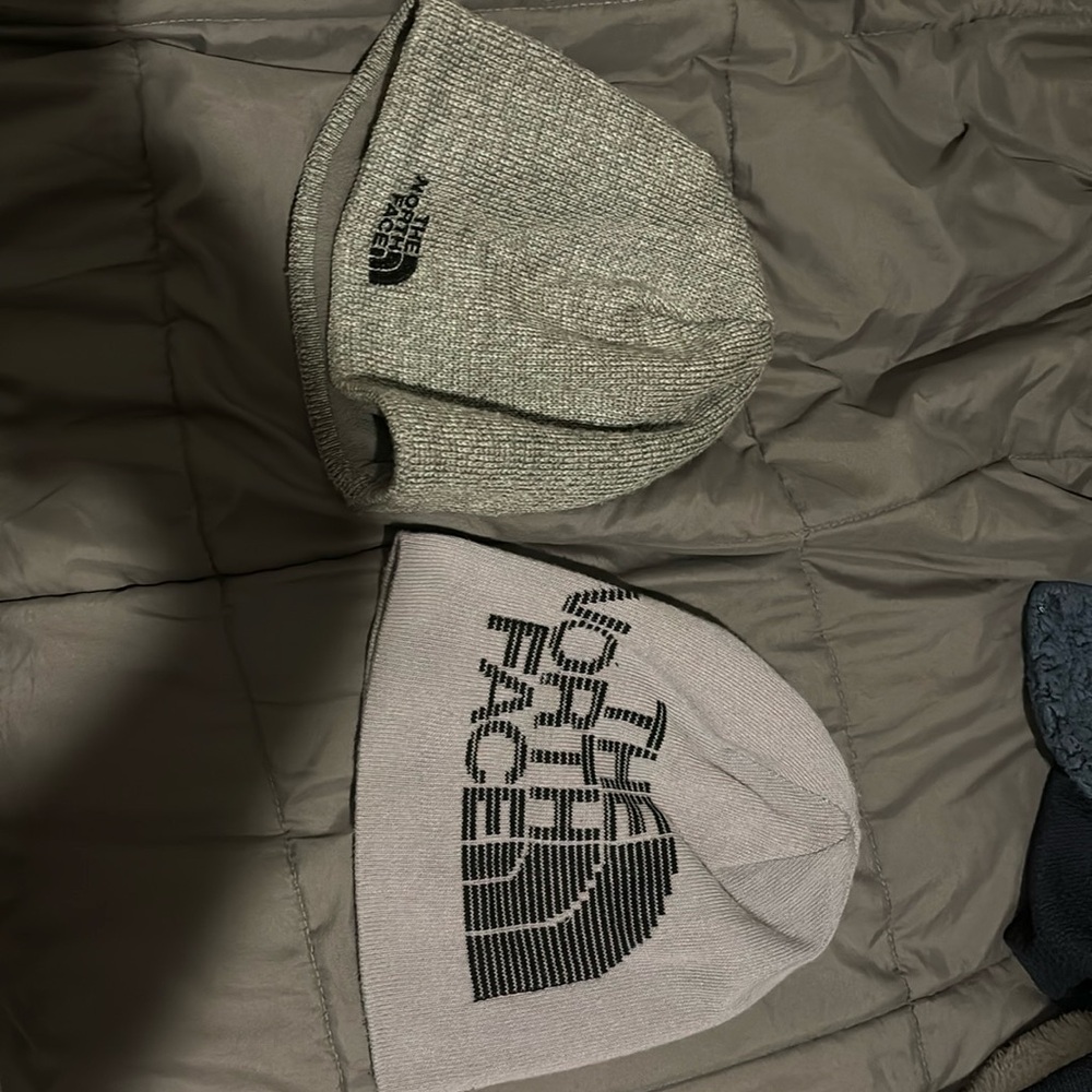 2 north face grey beanies men and they are both in very good shape